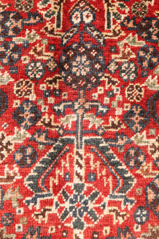 This antique Qashqai rug from Iran truly ticks all the boxes: it is in mint condition, with a full pile, exceptionally soft wool, and a highly intricate design. This level of detail ...