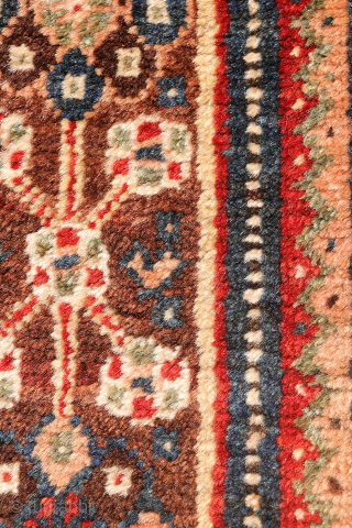 This antique Qashqai rug from Iran truly ticks all the boxes: it is in mint condition, with a full pile, exceptionally soft wool, and a highly intricate design. This level of detail ...