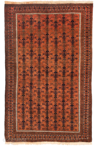 A finely woven antique Baluch rug from the Sistan area of Afghanistan, featuring a rare and charming design of a small plant or bush repeated across the entire field. With a very ...