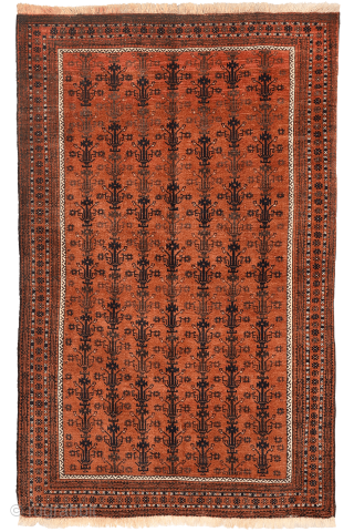 A finely woven antique Baluch rug from the Sistan area of Afghanistan, featuring a rare and charming design of a small plant or bush repeated across the entire field. With a very ...