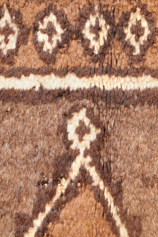 An unusual Qashqai gabbeh rug, likely woven with undyed natural camel wool. The rich color suggests the use of camel wool, and the weaver even included some camels in the design. Charming ...