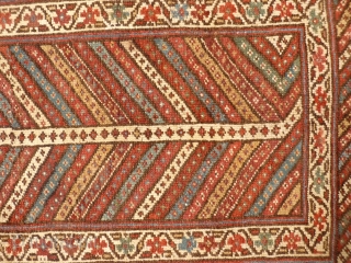 Lovely Kazak Gendje runner with earthy colours, and a lot of undyed wool. Low to medium overall pile, some repiling. With the arrival of the spring the branches started blooming! 198x88 cms,  ...