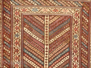 Lovely Kazak Gendje runner with earthy colours, and a lot of undyed wool. Low to medium overall pile, some repiling. With the arrival of the spring the branches started blooming! 198x88 cms,  ...