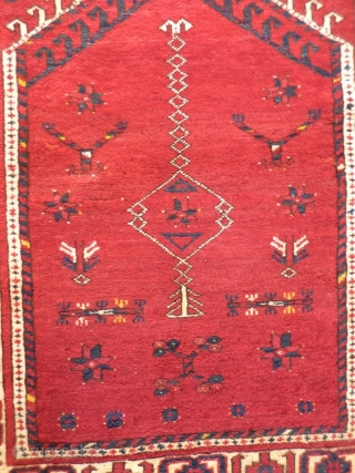 For this tightly woven Ersari rug, only the best quality soft and shinny wool has been used. The white strong and more formal border, frames a very interesting field filled with an  ...