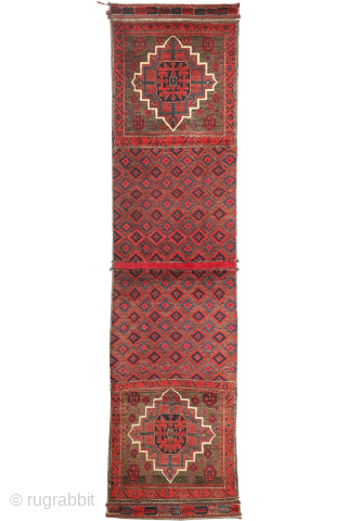 Rare  Baluch Runner from Iran – Design inspired by early Islamic architecture

This fascinating semi-antique Baluch runner from Iran features a rare and distinctive design. Originally crafted as a saddlebag, it has  ...