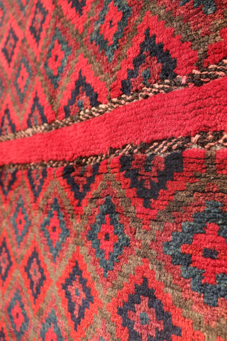 Rare  Baluch Runner from Iran – Design inspired by early Islamic architecture

This fascinating semi-antique Baluch runner from Iran features a rare and distinctive design. Originally crafted as a saddlebag, it has  ...