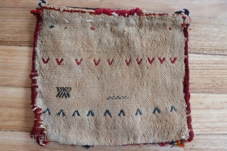 Small Qashqai mid century chanteh with soumak and floating weft embroidery onto warp faced cotton and wool ground, authentic used nomadic piece showing signs of wear consistent with age, 22cmx26cm.   