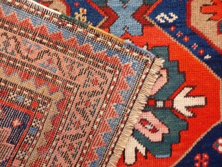 A Kuba rug with very vibrant natural colours and a nice design. The formality of the border and the mihrab contrasts with the introduction of animals and geometric floral motives throught the  ...