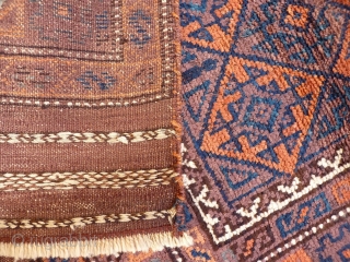 A coarsely woven Belouch prayer rug with the best quality soft wool. The feeling is that of a very tribal rug and the handle is similar to a gabbeh with a high  ...
