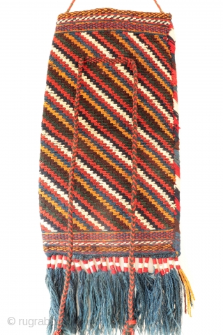 A superb soumak technique Afshar spindle bag, with a tree of life motive in the front and a diagonal striped motive at the back. As it is the case in many spindle  ...