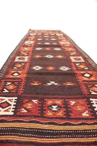 An antique Mugor Baluch runner from Ghazni Province in Afghanistan employing mainly undyed goat´s wool (the black and white areas) and sheep´s dyed wool. All the dyes are natural. It is a  ...