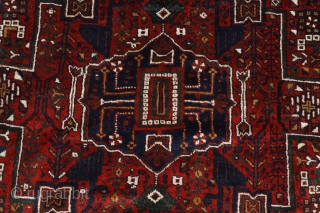 A very similar rug can be found in Cyrus Parham "Masterpieces of Fars rugs", plate 72. The limited, village-type carpet industry of Estahban District is primarily centered in the village of Eaj.

This  ...