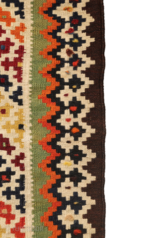 This highly collectible antique Qashqai kilim from Iran features a bold and captivating design. Made with top-quality natural dyes, it showcases rich, deeply saturated colors—including striking greens and blues—that sets it apart.

At  ...
