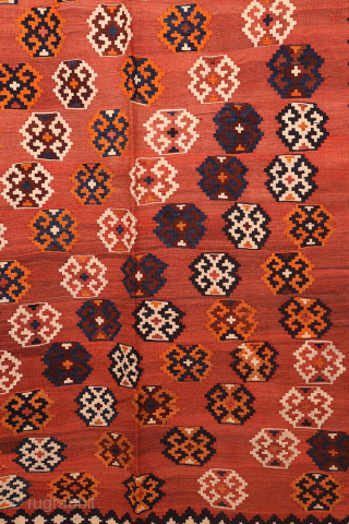 An antique Qashqai kilim woven with natural dyes. The wool is very finely spun. The pattern is arranged diagonally on a terracotta background with a beautiful abrash (colour changes). In mint condition.  ...