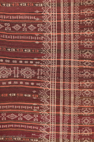 An earthy-toned (slightly aubergine hues) Serkhat Baluch Shaffi kilim with an exceptionally intricate pattern and refined drawing. The complexity of the design is achieved through the weaving of delicate linear motifs — ...