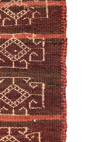 An earthy-toned (slightly aubergine hues) Serkhat Baluch Shaffi kilim with an exceptionally intricate pattern and refined drawing. The complexity of the design is achieved through the weaving of delicate linear motifs — ...