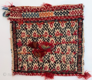 A pretty chantah or bag woven by Qashqai nomads from Southern Iran (could also be Luri?), purchased in our last trip to Iran. In mint condition, including the tassels, handles and decorative  ...