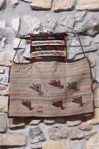 When the back can be more interesting than the front... ¡click to see all the images!
This lovely Qashqai namakdan or salt bag was woven with a combination of natural undyed wool and  ...