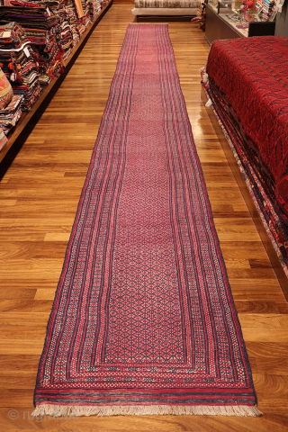 At over 10 metres (33.46 feet) this is the longest antique kilim runner we have seen!
In three decades of dealing in antique kilims, this very long antique Turkman kilim runner stands out ...