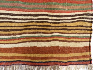 A beautiful Qashqai kilim that originally was a large bag. All the dyes are natural, including a beautiful green and mustard yellow. Very finelly woven. And yes, we know, it is not  ...