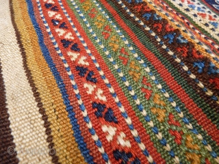 A beautiful Qashqai kilim that originally was a large bag. All the dyes are natural, including a beautiful green and mustard yellow. Very finelly woven. And yes, we know, it is not  ...
