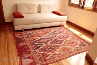 A kilim from the Obruk region, very finelly woven combining plain weave with cicim technique. The desing is composed of a well organised central field with two asimetric borders, both in terms  ...