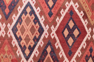 A kilim from the Obruk region, very finelly woven combining plain weave with cicim technique. The desing is composed of a well organised central field with two asimetric borders, both in terms  ...