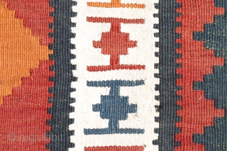 kilim from the Lori or Luri tribe of Iran. This kilim stands out for the three large medallions that occupy the entire central field. All dyes are natural. The weft, as seen  ...