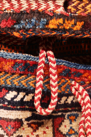 This saddle bag, also known as a Khorjin, is a fine example of traditional weaving, crafted from top-quality, finely spun wool. The meticulous spinning of the wool has allowed for a notably  ...