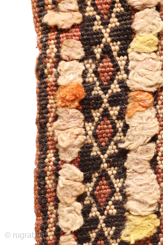 Discover this very rare and collectible Baluch pillow, a standout piece featuring exquisite wool and silk highlights.

The front of the pillow showcases a beautiful design where the yellow, purple, and orange threads  ...