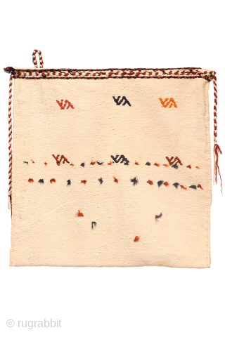 Enjoy this large and truly authentic chanteh, or tribal bag, a piece that feels untouched by commercial circuits. Woven with a white cotton warp and weft, it’s vibrantly decorated with a array  ...