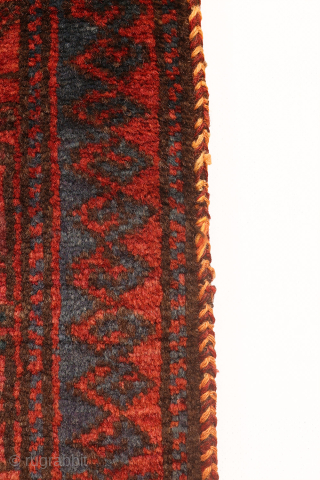 A fantastic antique Afghan Baluch prayer rug. The design is creative and unusual. The wool is of superior quality, soft and shinny and dyed with natural dyes. The rug has a couple  ...