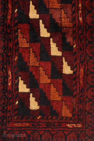 This Turkman band was woven with incredibly soft and lustrous wool that reflects light beautifully. It features natural dyes that create a rich and harmonious color palette. The design is presented in  ...