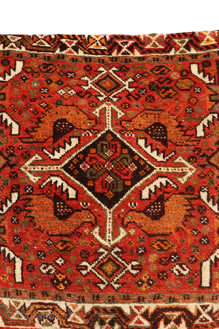 This khorjin, or saddlebag, is a delightful example of tribal weaving. Its focal point is a central medallion elegantly framed by four realistically woven birds nestled in the corners. A charming detail,  ...