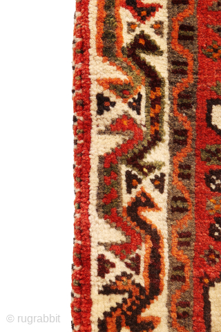 This khorjin, or saddlebag, is a delightful example of tribal weaving. Its focal point is a central medallion elegantly framed by four realistically woven birds nestled in the corners. A charming detail,  ...
