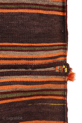 This khorjin, or saddlebag, is a delightful example of tribal weaving. Its focal point is a central medallion elegantly framed by four realistically woven birds nestled in the corners. A charming detail,  ...