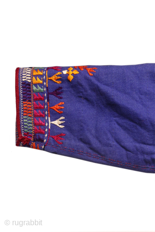 rare antique wool chapan, a piece that showcases remarkable textile artistry. This coat features extensive embroidered decoration with intricate details and a well-composed design.

Made from thick wool and lined with antique Russian  ...
