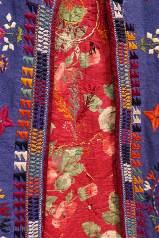 rare antique wool chapan, a piece that showcases remarkable textile artistry. This coat features extensive embroidered decoration with intricate details and a well-composed design.

Made from thick wool and lined with antique Russian  ...
