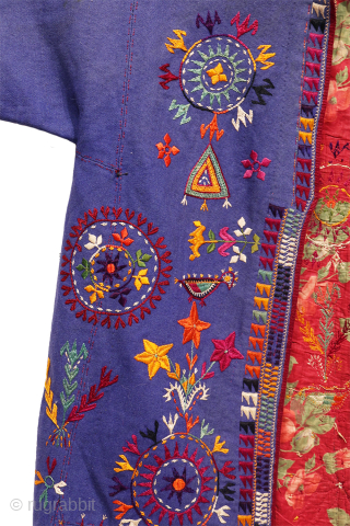 rare antique wool chapan, a piece that showcases remarkable textile artistry. This coat features extensive embroidered decoration with intricate details and a well-composed design.

Made from thick wool and lined with antique Russian  ...