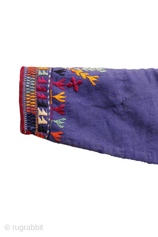 rare antique wool chapan, a piece that showcases remarkable textile artistry. This coat features extensive embroidered decoration with intricate details and a well-composed design.

Made from thick wool and lined with antique Russian  ...