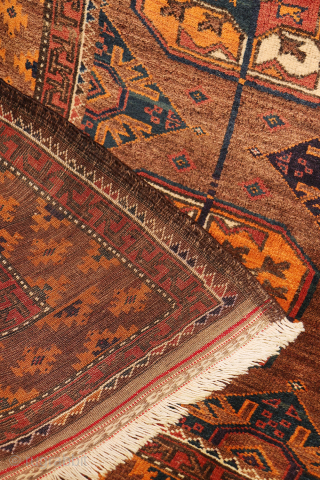 An antique Baluch rug featuring an exceptional emerald green colour.
This finely woven Baluch rug has a remarkably high knot density, allowing for an intricate and detailed design. The field is decorated with ...