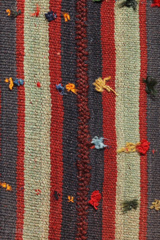 This big Qashqai kilim was woven with finely spun wool, showcasing exceptional craftsmanship. It is a moj (or jajim), a traditional kilim typically used to cover rugs and other textiles. However, this  ...