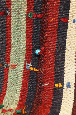 This big Qashqai kilim was woven with finely spun wool, showcasing exceptional craftsmanship. It is a moj (or jajim), a traditional kilim typically used to cover rugs and other textiles. However, this  ...