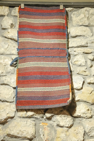 This Luri saddlebag has been woven with the knotted technique at the front and with kilim for the back. All dyes are natural (with a beautiful  blue and green) and the  ...