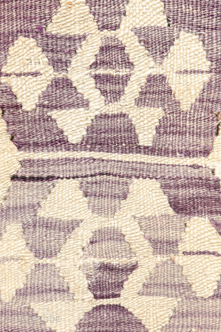 Early 20th-Century Sutlegen Kilim – Anatolia

Antique kilim from Suteglen, dating from the early 20th century, is a stunning example of Anatolian village weaving. Its main design features three vertical columns of hexagons:  ...