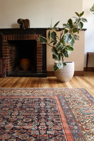 An unusual wide yellow border antique malayer rug from around 1870. One small low pile area where the warp and weft are exposed. Otherwise with low pile worn evenly. All natural dyes  ...