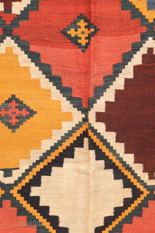 Antique Qashqai Kilim with gabbeh like Design.

This antique Qashqai kilim features a superb design brought to life with richly saturated natural dyes, including deep indigo blue, emerald green, and mustard tones. The  ...
