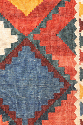 Antique Qashqai Kilim with gabbeh like Design.

This antique Qashqai kilim features a superb design brought to life with richly saturated natural dyes, including deep indigo blue, emerald green, and mustard tones. The  ...