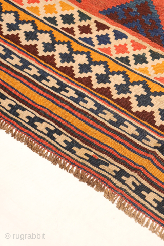Antique Qashqai Kilim with gabbeh like Design.

This antique Qashqai kilim features a superb design brought to life with richly saturated natural dyes, including deep indigo blue, emerald green, and mustard tones. The  ...