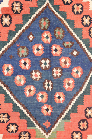 Antique Qashqai Kilim with and Unusual Green Palette

This antique Qashqai kilim follows traditional tribal patterns—but with a distinctive twist. While it retains the classic diamond medallion structure typical of Qashqai weaving, what  ...